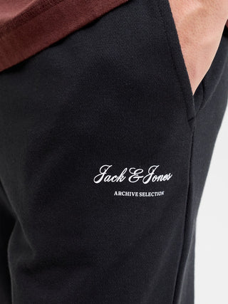 Ανδρικό παντελόνι φόρμας JPSTGORDON ARCHIVE SWEAT PANTS JACK&JONES 12288641 BLACK NOOS W26/27