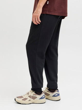 Ανδρικό παντελόνι φόρμας JPSTGORDON ARCHIVE SWEAT PANTS JACK&JONES 12288641 BLACK NOOS W26/27